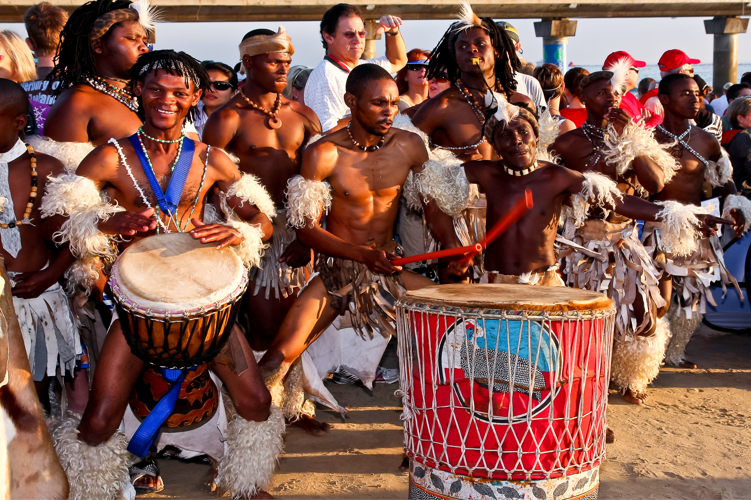 Zimbabwean artist playing drums during a bims drum show